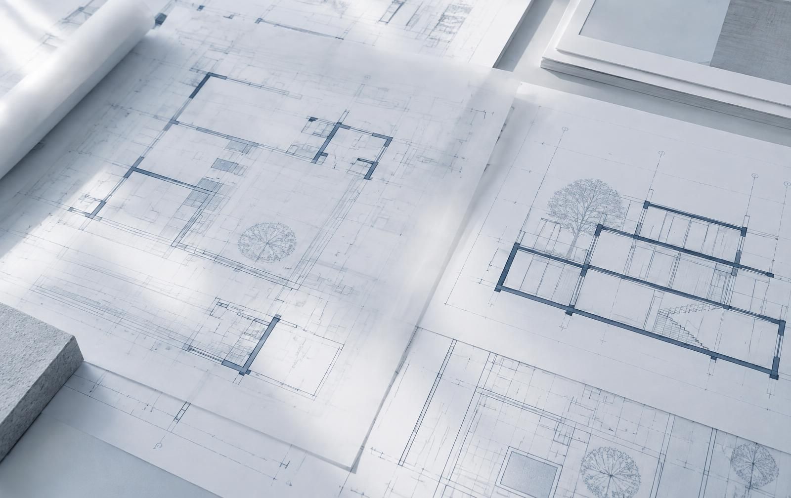 Layered technical drawings showing relationships between plans
